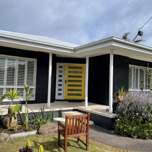 Ocean grove exterior repaint with view of garden