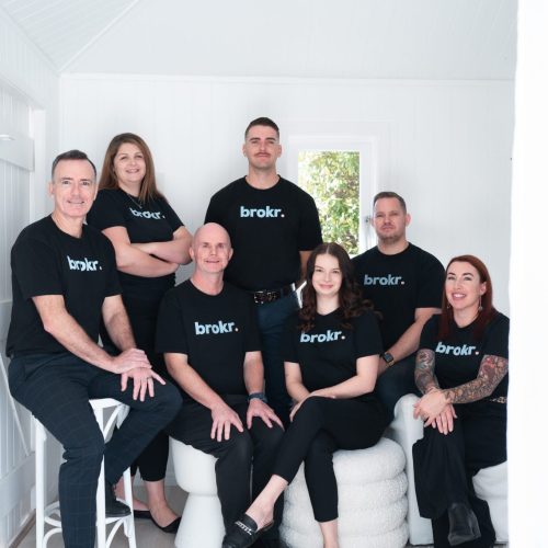 Team sitting scaled 1