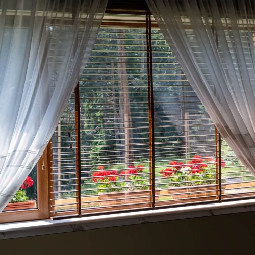 pairing curtains with plantation shutters 01