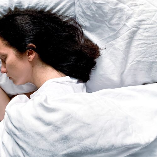 young millennial candid woman sleeping at home on 2023 11 27 05 06 45 utc