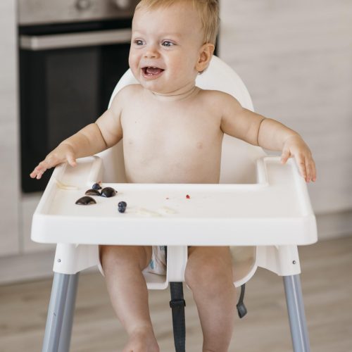 happy baby highchair choosing what fruit eat