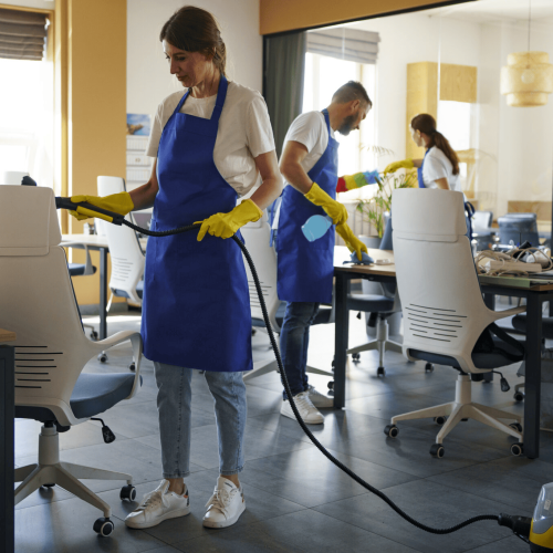 professional cleaning service person using vacuum cleaner office 2048x1365 1